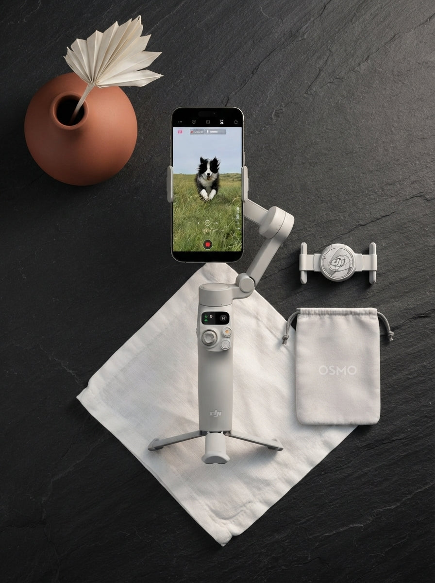DJI Osmo Mobile 7 gimbal displayed on a dark charcoal surface with elegant burnt sienna and white accents in a clean, minimal